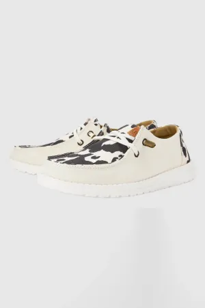 HEYDUDE Women’s Wendy Cow Print Shoes in White/Black | 41037-11G