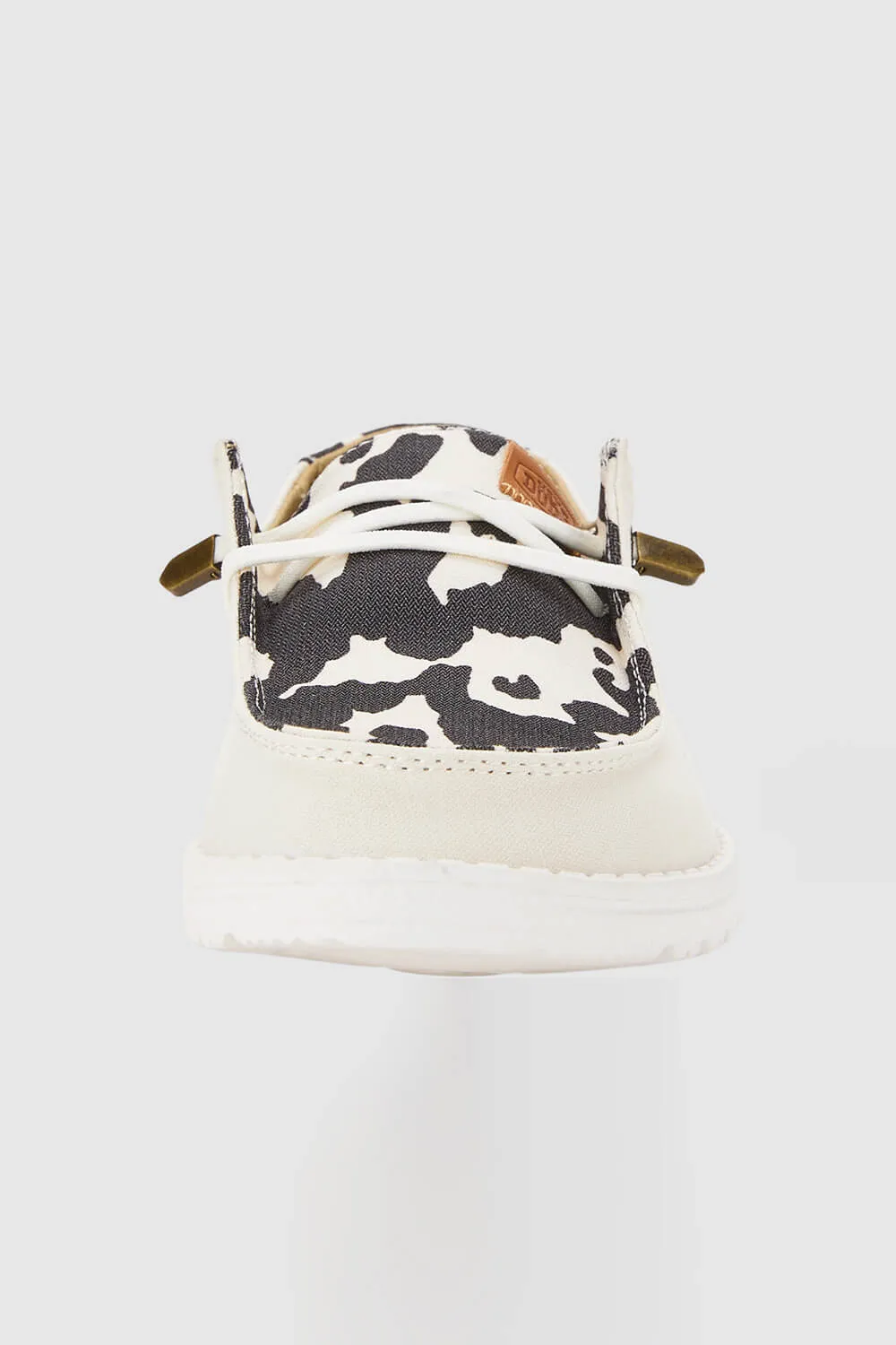 HEYDUDE Women’s Wendy Cow Print Shoes in White/Black | 41037-11G