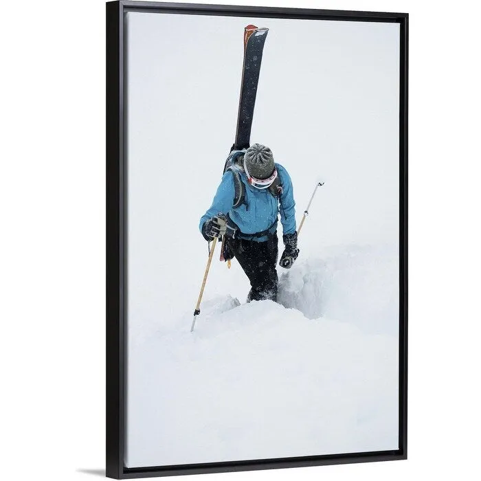 "A young woman packs her skis and kick steps up a section of trail" Black Float Frame Canvas Art